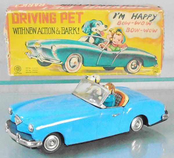 KANTO KAISER DARRIN: litho tin, friction working, 8 in long, dog rocks as car moves, orig box some wear, Ichiko markings, C8.