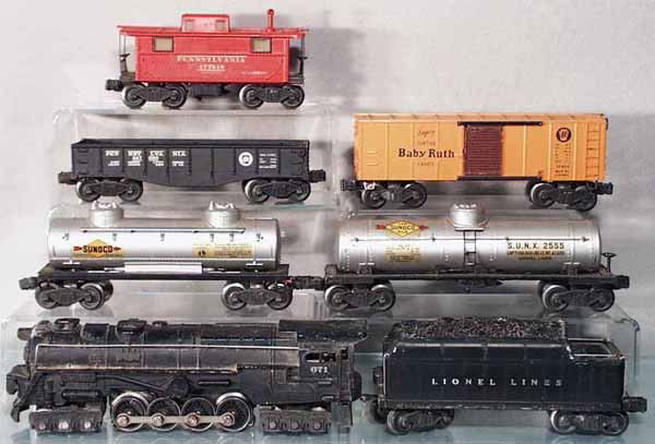 LIONEL TRAIN SET: O ga, 671 turbine loco, early version, no E-unit slot, w/smoke bulb, front keystone worn, 671W tender, silver lettering, 2465 Sunoco tank, missing 1 handrail, 2555 Sunoco tank, 1 decal scratched, 2452