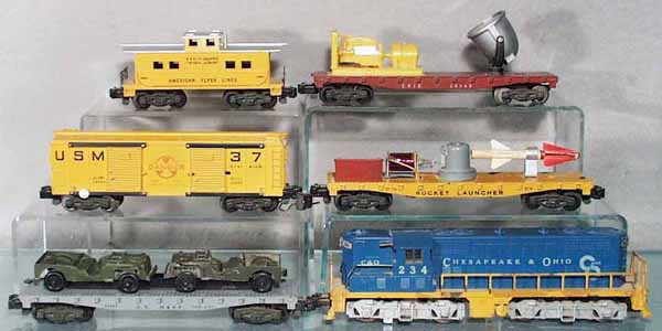 AMERICAN FLYER DEFENDER TRAIN SET: S ga, 234 C&O GP diesel, 24557 Navy flat w/Jeeps, 25056 rocket launcher & box car, missile worn & incom, 24549 searchlight generator, 24631 caboose, C5-7.