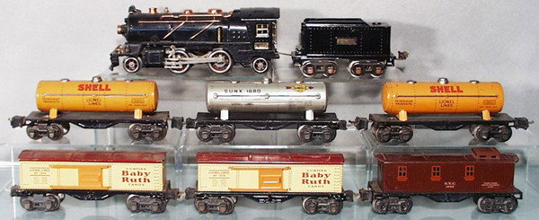 LIONEL TRAIN SET: O ga, 262 loco, some touch up spots on cab & boiler, 262T tender, repainted & missing coal load, 3 #1680 tank cars, 2 #1679 box cars, 1682 caboose, C5-6.
