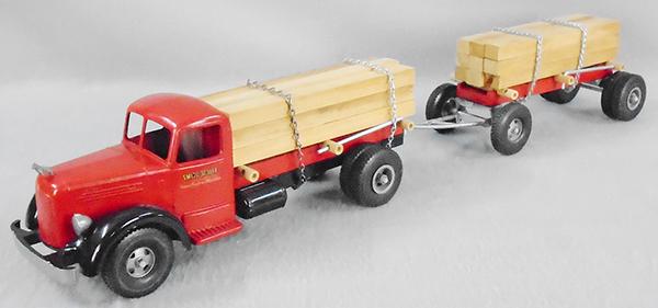 SMITH MILLER MACK TANDEM TIMBER TRUCK: die cast & wood, 36 in long, red & black, ca 1950, professionally restored, C9.