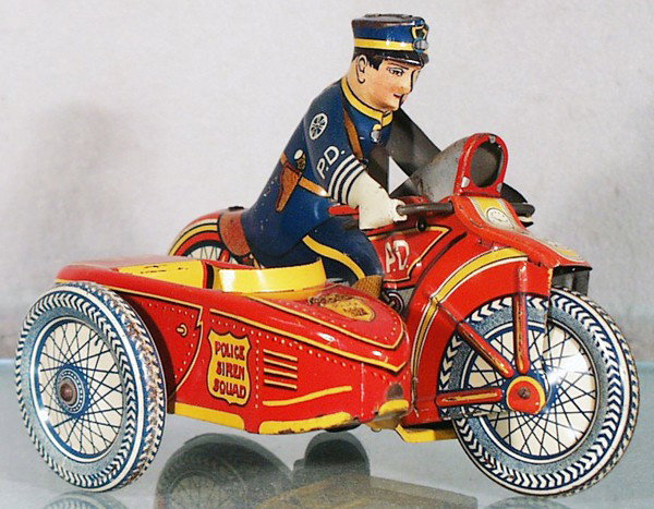 MARX POLICE SIREN SQUAD MOTORCYCLE: litho tin, clockwork not working, 8" long, missing sidecar's plastic windshield, C7.