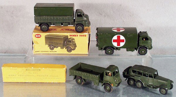 5 DINKY MILITARY TOYS: 603 Army Personnel, w/11 die cast figures & 1 plastic figure, orig box minor wear, 623 ArmyWagon, 152B Reconnaissance Car, die cast hubs fatiguing, 623 Covered Wagon, rubs on roof, orig box rough, 626