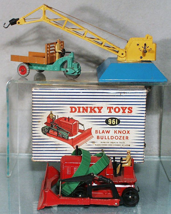 3 DINKY VEHICLES: 961 Blaw Knox Bulldozer, w/pair of replacement treads, orig box worn, no insert, 752 Goods Yard Crane, needs restringing, 342 Motocart, all have some playwear, C5-6.