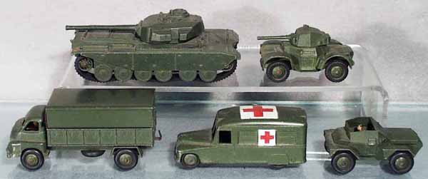 5 DINKY MILITARY VEHICLES: 651 Centurion Tank, treads frozen, 670 Armored Car, 621 3-ton Truck, 624 Ambulance, 673 Scout Car, C5-6.