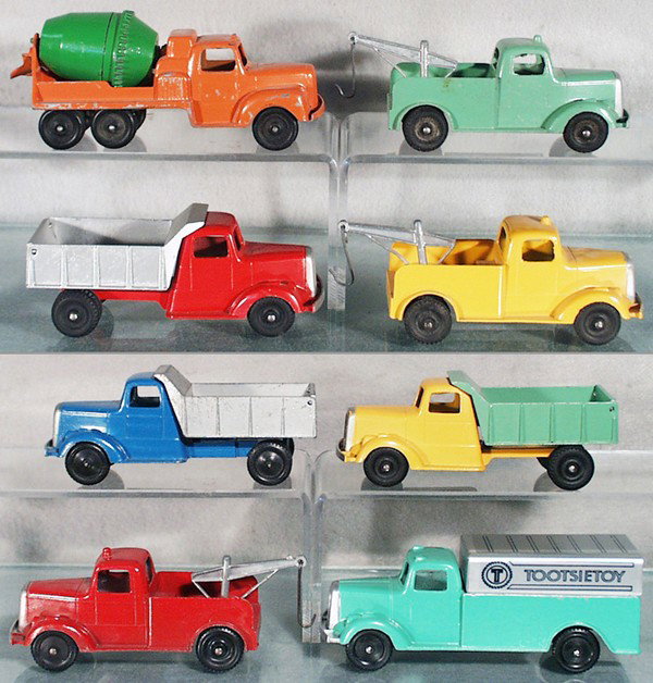 8 TOOTSIETOY MACK TRUCKS: Cement Mixer, 3 Wreckers, 3 Dump Trucks, Box Truck, restored, C5-9.