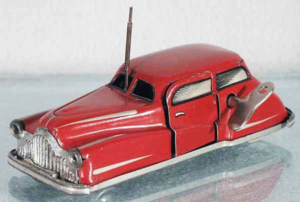 JOUSTRA 2002 AUTO: litho tin, clockwork working, 5 1/4" long, C7-8.