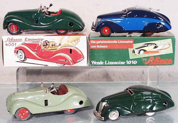 4 SCHUCO AUTOS: contemporary versions, 4001 Examico, 1010 Limousine, 4001 Examico, w/opening hood, missing windshield, 5000 Music Box Auto, all are clockwork working, C8-9.