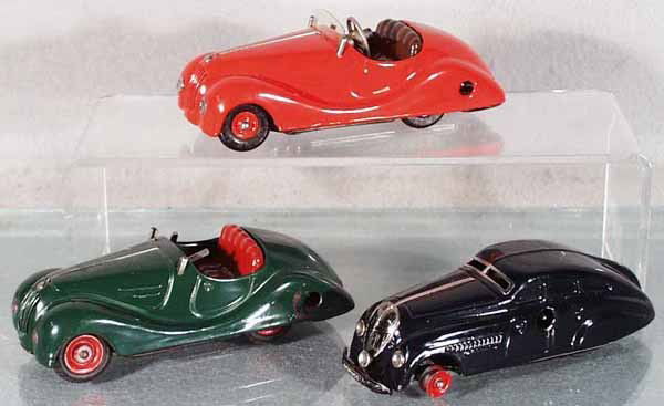 2 SCHUCO AUTOS: 2 #2002 Akusticos, 1 missing steering wheel & windshield, 1250 Garage Auto, missing 1 tire, clockwork working, all are orig issues, C6-7.