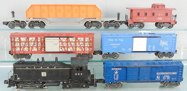 LIONEL TRAIN SET: O ga, 623 ATSF switcher w/3 stantion handrail, 6468 B&O auto box car, 6434 poultry dispatch, 6418 flat w/girders, 3424 operating brakeman, 6257 caboose, orig boxes are rough, C6-8.