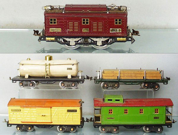 LIONEL TRAIN SET: std ga, 8 loco, rewheeled, 2 wheels fatiguing, 511 lumber, 514 box car, 515 tank, 517 caboose, C4-5.