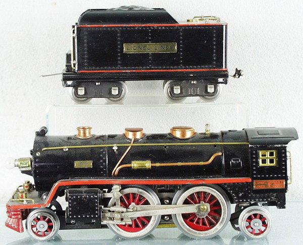 LIONEL 395E TRAIN SET: std ga, 390E loco, rewheeled, 390T tender, 512 gondola w/7 split barrels, 514 box car, 513 stock, 511 lumber, 515 tank, 517 caboose, orig boxes & set box minor wear, C7-8.