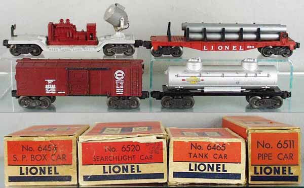4 LIONEL FREIGHT CARS: O ga, 6520 searchlight, 6511 pipe car, 6454 SP box car, 6465 Sunoco tank, orig boxes minor wear, C6-8.