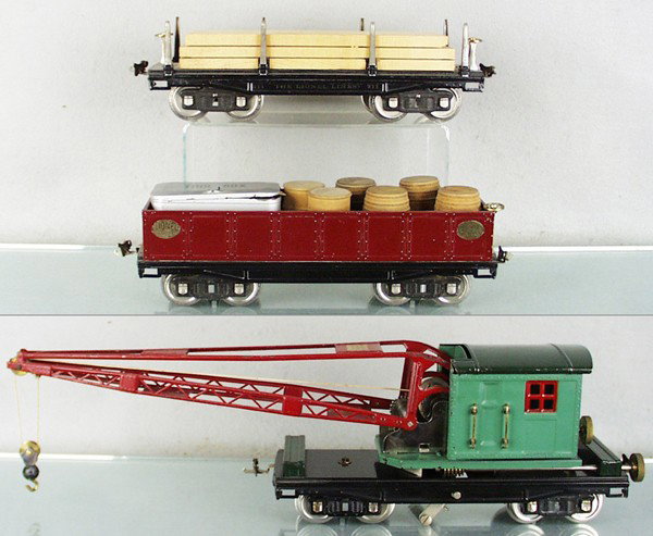 3 LIONEL FREIGHT CARS: std ga, 211 lumber flat, 512 gondola w/6 split barrels & Pride Lines 812 tool kit, 219 crane, C7-8.