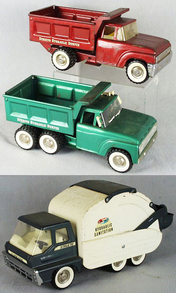3 STRUCTO TRUCKS: painted pressed steel, 223 Hydraulic Dump Truck, red, windshield chipped, 14" long, 220 Hydraulic Dump Truck, green, 14" long, Hydraulic Sanitation Truck, scratched windshield, 17" long, all have some