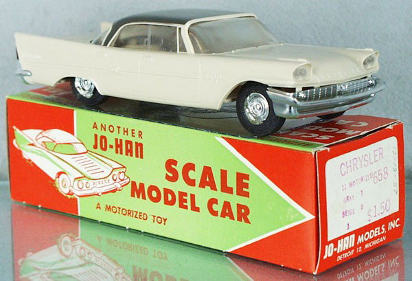 JO-HAN 1958 CHRYSLER NEW YORKER PROMO: gray & beige, friction working, no interior, body warped, orig box, cellophane intact, C8.