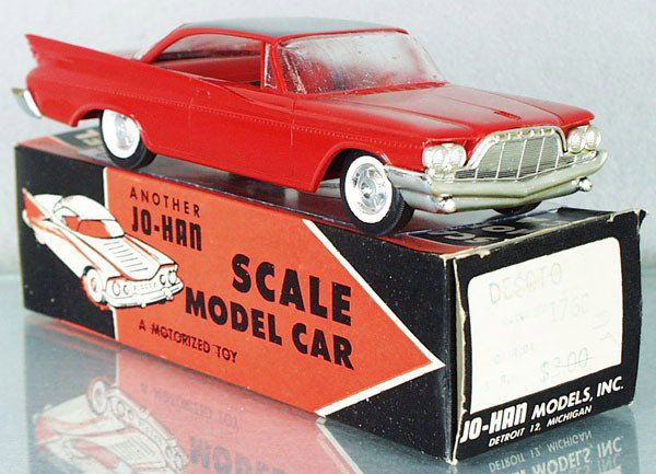 JO-HAN 1960 DESOTO ADVENTURER PROMO: red, friction working, w/interior, very minor body warp, windshield glazing, orig box minor wear, cellophane intact, C8.