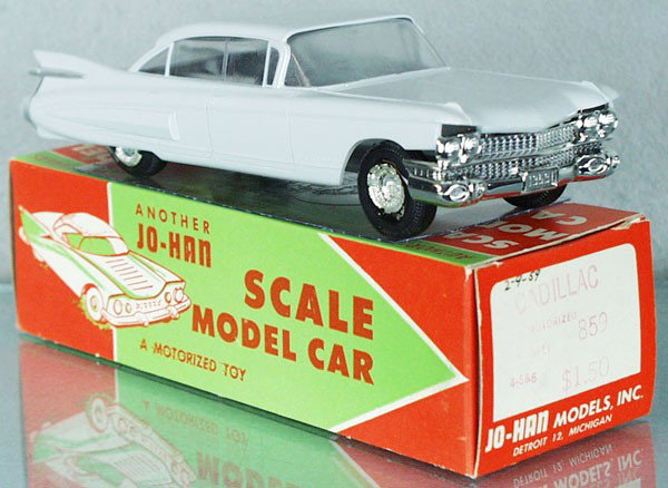 JO-HAN 1956 CADILLAC FLEETWOOD PROMO: gray, friction not working, wheels melted, no interior, body warped, orig box, cellophane intact, C7.