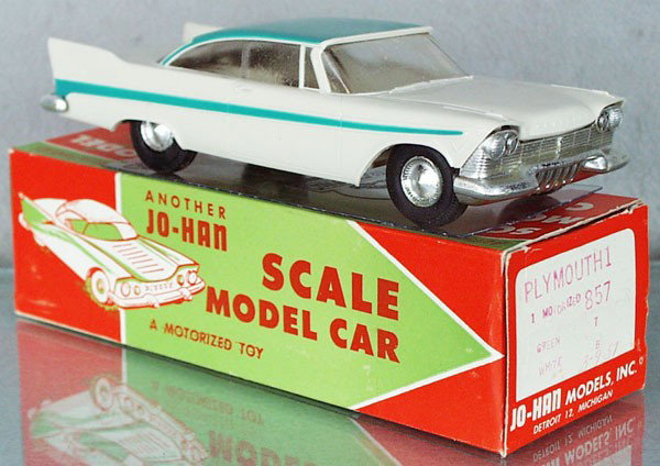 JO-HAN 1957 PLYMOUTH BELVEDERE PROMO: white & green, friction working, no interior, minor body warp, windows glazing, orig box minor wear, cellophane intact, C7.