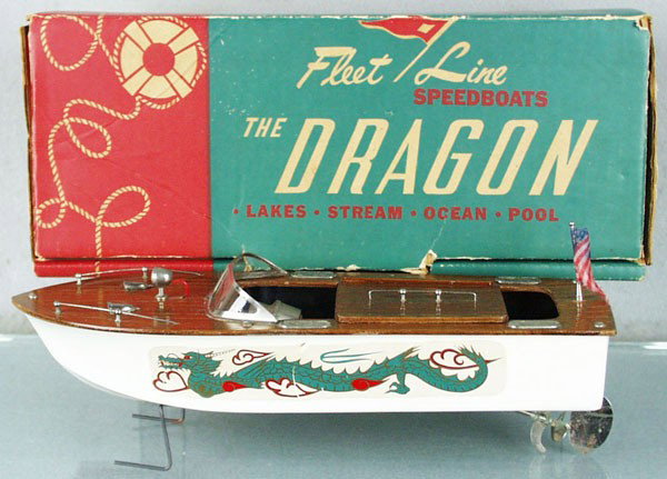 K&O FLEET LINE 201 DRAGON SPEED BOAT: wood, battery operated, not tested, 12 1/2" long, inboard, w/worn flag, orig box & insert, C7-8.