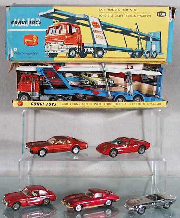 6 CORGI VEHICLES: 1138 Ford Auto Transport, missing both side mirrors, orig box & insert minor wear, w/312 Jaguar, 314 Ferrari, 327 MGB GT, red, 276 Toronado, 310 Corvette, chrome trim yellowing, C5-7.