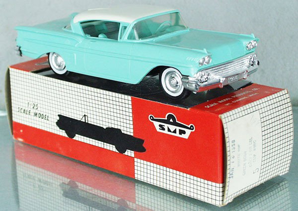 SMP 1958 CHEVROLET IMPALA PROMO: green & white, friction working, w/interior, minor body warp, orig box minor wear, cellophane intact, C8.