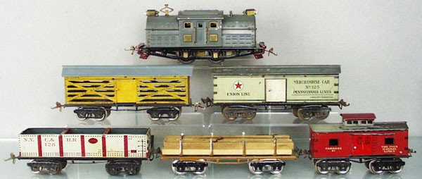 IVES TRAIN SET: O ga, 3257 loco, 1 end dented, 127 stock car, roof repainted, 125 PRR box car, roof flaking, 123 lumber flat, paint flaking, 128 hopper, missing 1 coupler, 67 caboose, paint flaking on roof, C4-5.