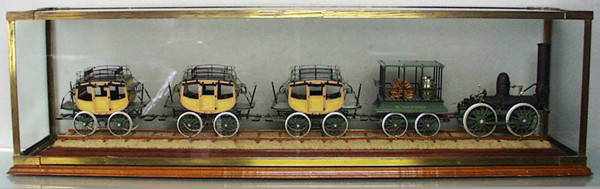 DEWITT CLINTON TRAIN SET: made by John Petterson in 1948/49, it won 1st prize at the NY Society of Model Engineers in the livesteam locomotive class, painted wood & metal, 34" long, w/5 period photos & 2 price certificates,