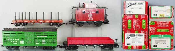 4 LGB FREIGHT CARS: G ga, 4068, 4061, 1 brakewheel loose, other glued, 1 corner tab chipped off, 1 handrail missing, others glued, 4060, 4065, 1 lantern glued on, 2 catwalk tabs glued, roof has minor wear, orig boxes som