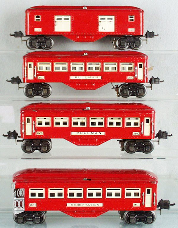 4 LIONEL COACHES: O ga, 2602 baggage, lettering worn, 2 #2600 Pullmans, 2601 obsv, red & ivory, C5-6.