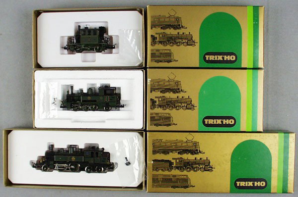 3 TRIX TANK LOCOS: HO ga, 2430, 3-rail, 22424, 2-rail, 1 decal worn, 1 small piece of trim loose, 22410, 2-rail, some decal wear, orig boxes & inserts, C8-9.