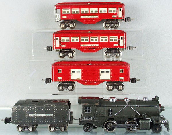 LIONEL TRAIN SET: O ga, 249E loco, 265W tender, paint worn, 602 baggage, 600 Pullman, 601 obsv, red & ivory, orig boxes rough, C5.