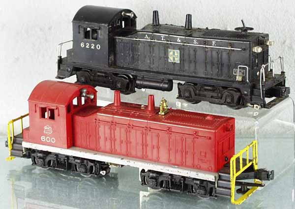 2 LIONEL SWITCHERS: O ga, 6220 Santa Fe, missing ornamental bell, 600 MKT, 1st version, C5.