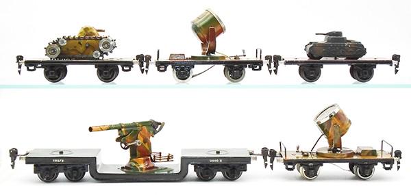 5 MARKLIN MILITARY CARS: O ga, handpainted tin, 1984M flat w/tank, 2 #1959 searchlight cars, flat w/8021 die cast tank, 1955 flat w/flak gun, C6-8.