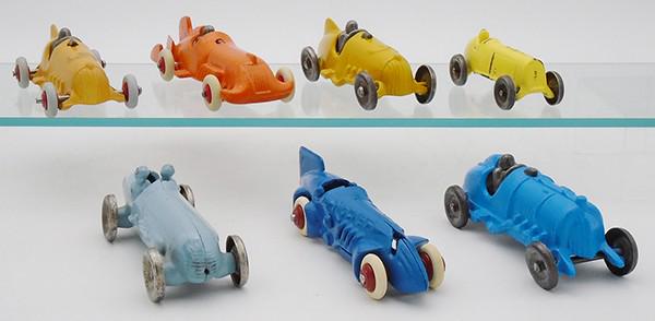 7 CAST IRON RACE CARS (1 of 2)