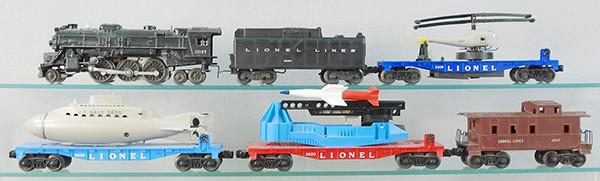 LIONEL TRAIN SET: O ga, 2037 loco, repainted, 6026W tender, 3419 operating helicopter, 1 broken tail rotor, 3830 operating submarine, missing periscope, 6650 missile launching car, 6017 caboose, C5-6.