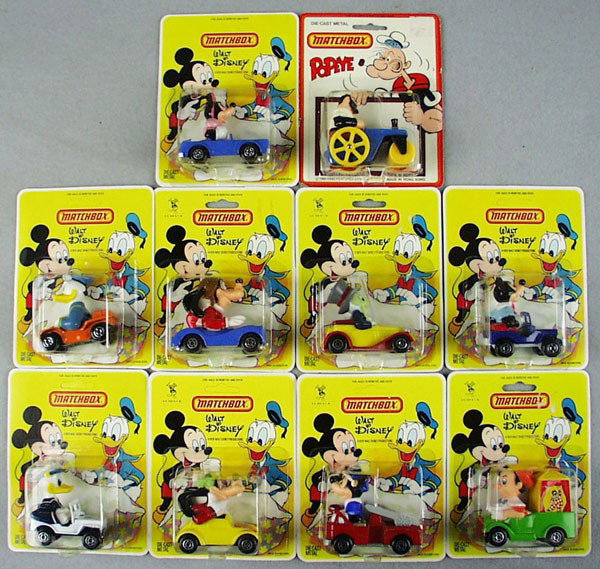 10 MATCHBOX DISNEY & POPEYE VEHICLES: 9 Disney, 1 Popeye, all different, sealed on orig cards, C10.