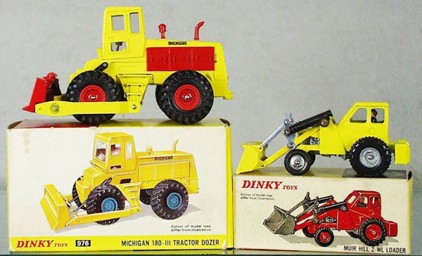 2 DINKY CONSTRUCTION VEHICLES: 976 Michigan Tractor Dozer, 437 Muir Hill 2-WL Loader, rust on 1 axle end, orig boxes minor wear, 1 insert, C8.