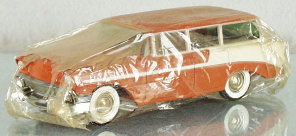PMC 56 CHEVROLET WAGON BANK PROMO: bronze & white, w/metal insert in chassis for bank, partially wrapped in cellophane, C8-9.