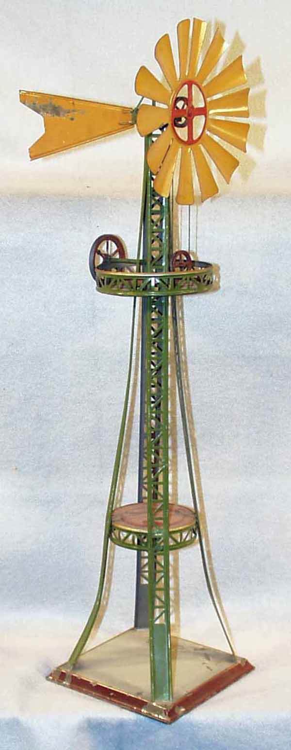DOLL WINDMILL STEAM ACCESSORY: handpainted tin, some paint flaking, 22.5" tall, C6. Complete information covering terms, conditions, payment and shipping is listed below. Please read and understand the information before bidding.