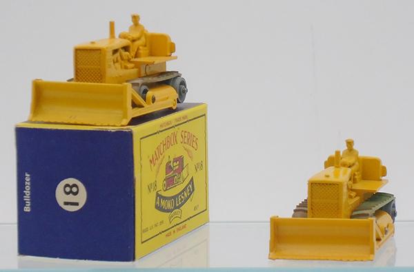 MATCHBOX 18C BULLDOZERS: 18C1, yellow body & blade, base type A, No 8 cast, metal rollers, flexible treads, B5 orig box, 18C2, yellow body & blade, base type A, No 18 cast, treads frozen, C9.