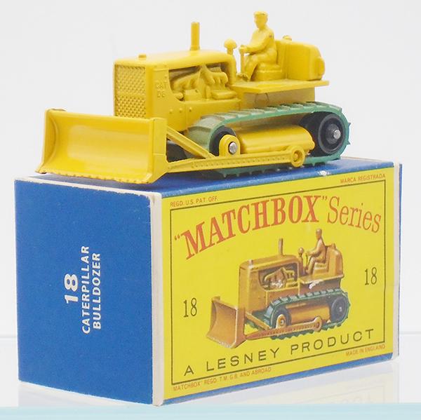 MATCHBOX 1816 CATERPILLAR BULLDOZER: yellow body & blade, base type B, no number on base, type D black plastic rollers, flexible treads, minor chips to high points, D2 orig box has puncture from exhaust stack, C8.