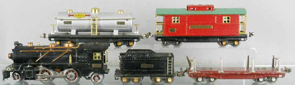 LIONEL TRAIN SET: O ga, 261 loco, 261T tender, missing drawbar, some surface oxidation spots, 811 lumber car, missing lumber, 815 tank car, 817 caboose, missing 2 journals, C5.
