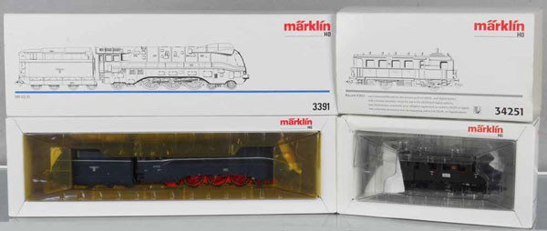 2 MARKLIN LOCOS: HO ga, 3391 German Express loco & tender, blue, 34251 German Kittle rail car, orig boxes & inserts, 1 insert cracked & yellowed, C9-10.
