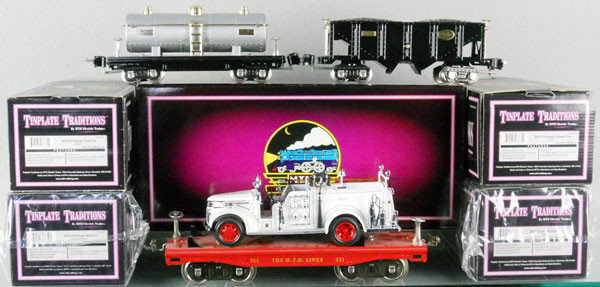 5 MTH LIONEL FREIGHT CARS: O ga, 10-8002, 10-8006, both sealed in orig boxes, 10-8004, 10-8008, 10-2168 flat w/fire truck, std ga, orig boxes, C8-10.