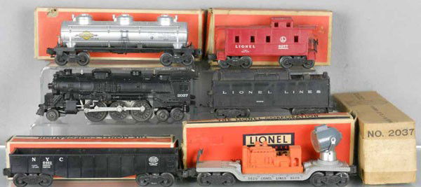 LIONEL TRAIN SET: O ga, 2037 loco, 6026W tender, 6415 tank, 6462 gondola, 3620 searchlight, 6257 caboose, 5 orig boxes only, boxes worn, C5-7.