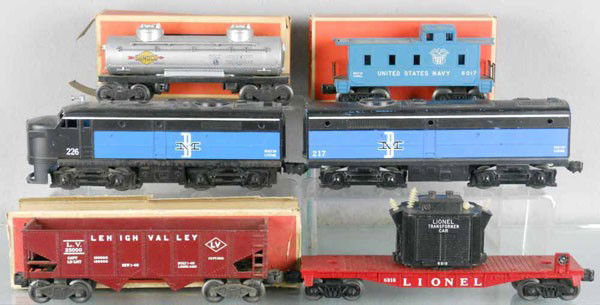 LIONEL TRAIN SET: O ga, 226217 B&M Alco AB diesels, coupler support bar broken, oxidation spots on frame, 6456 hopper, 6818 transformer car, 2 insulators broken, 6456 tank, 6017 Navy caboose, w/3 orig boxes only, 2 box
