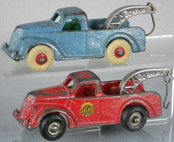2 ARCADE FORD WRECKERS: painted cast iron, 6" long, blue car is an old repaint, C4-5.
