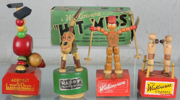 4 WOODEN ACTION TOYS: Kohner 128 Acrobat, Happy the Wonder Dog, Wakouwa Skier, Wakouwa Hit & Miss Boxers, w/rough orig box, all are painted wood, 4 1/2" to 6 1/4" tall, C5-7.