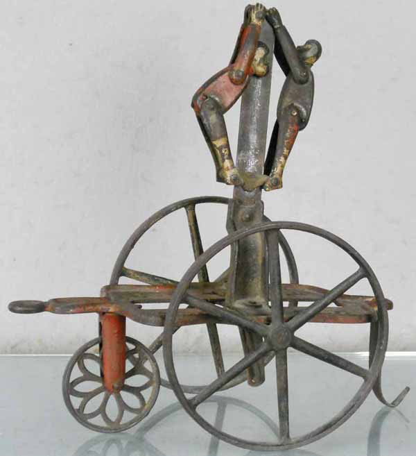 IVES MONKEY PULL TOY: painted cast iron, 10 1/2" tall, paint worn, C5.